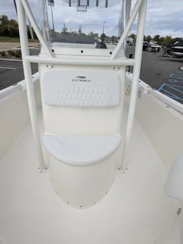 Slide: The Image of Open storage compartment on 2025 Cobia 220 CC boat. - 29