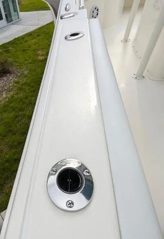 Slide: The Image of 2025 Cobia 220 CC boat video walkthrough and highlights on display page. - 47