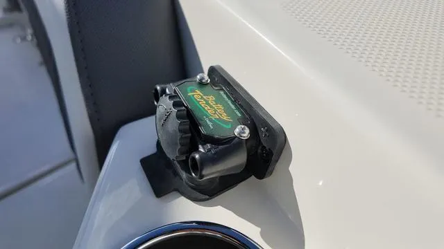 Slide: The Image of Battery charger port on 2025 Cobia 265 CC boat. - 38