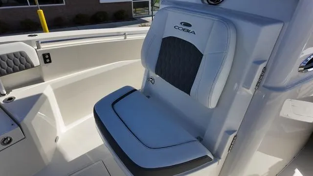 Slide: The Image of 2025 Cobia 265 CC boat seat with sleek design and comfortable cushioning. - 41
