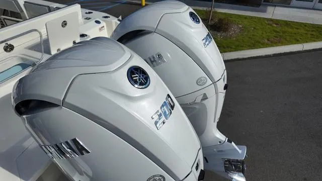 Slide: The Image of Twin Yamaha 200 outboard engines on a 2025 Cobia 265 CC boat. - 6