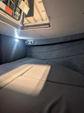 Slide: The Image of Interior cabin of 2025 Thunder Jet Pilot 26' boat with cozy sleeping area. - 35