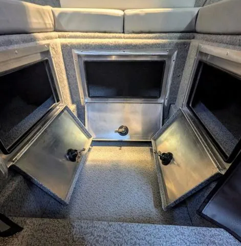 Slide: The Image of Interior storage compartments of 2025 Thunder Jet Pilot 26' boat. - 39