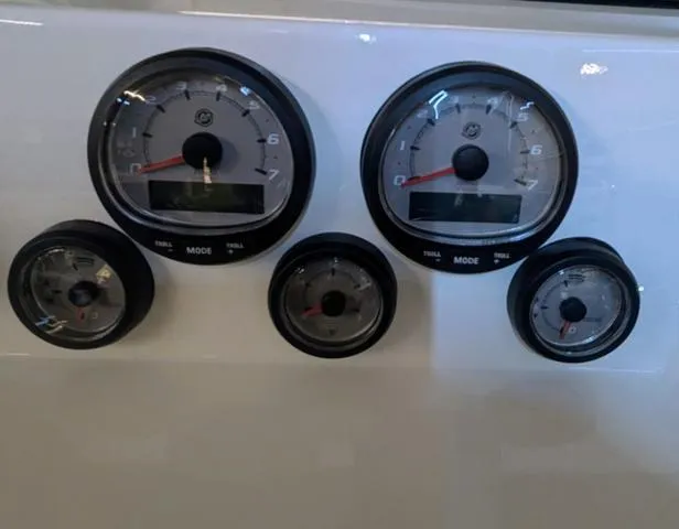 Slide: The Image of Dashboard gauges of 2025 Thunder Jet Pilot 26' boat. - 44