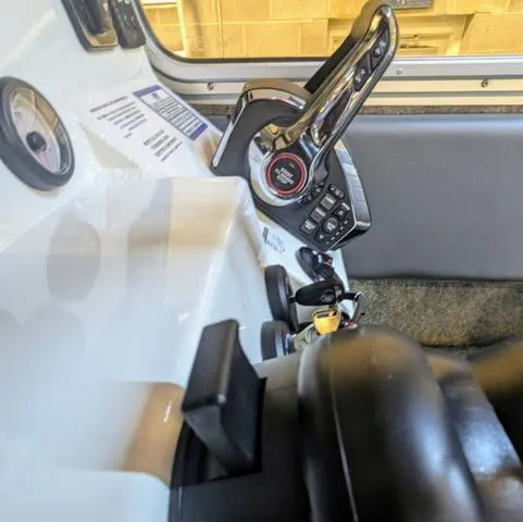 Slide: The Image of 2025 Thunder Jet Pilot 26' boat control panel with throttle and gauges. - 46