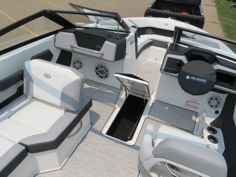 Slide: The Image of 2025 Cobalt CS23 boat interior with modern seating and dashboard design. - 17