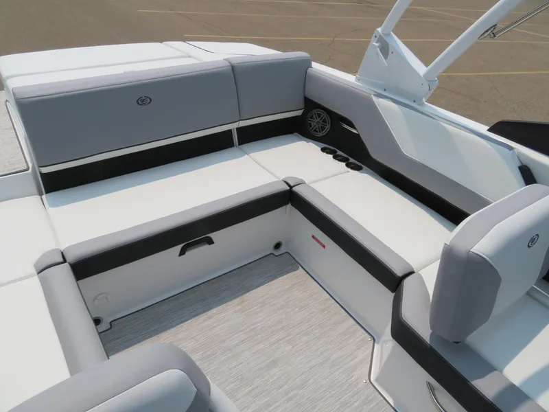 Slide: The Image of 2025 Cobalt CS23 boat interior with sleek gray and white seating design. - 9