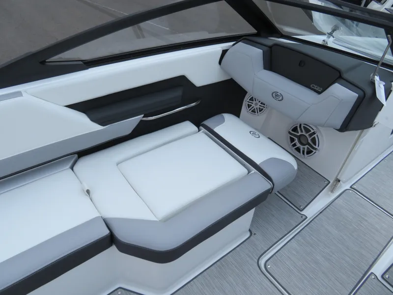 Slide: The Image of 2025 Cobalt CS22 boat interior with sleek seating and modern dashboard design. - 11