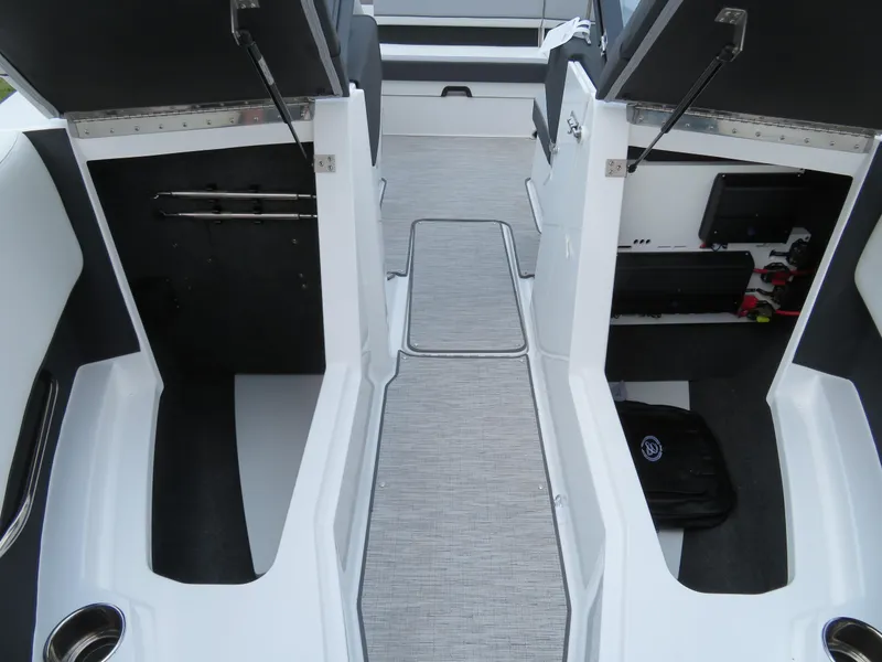 Slide: The Image of Interior view of 2025 Cobalt CS22 boat, featuring sleek seating and modern design elements. - 16