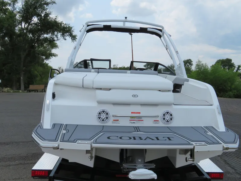 Slide: The Image of 2025 Cobalt CS22 boat rear view, showcasing sleek design and modern features. - 4