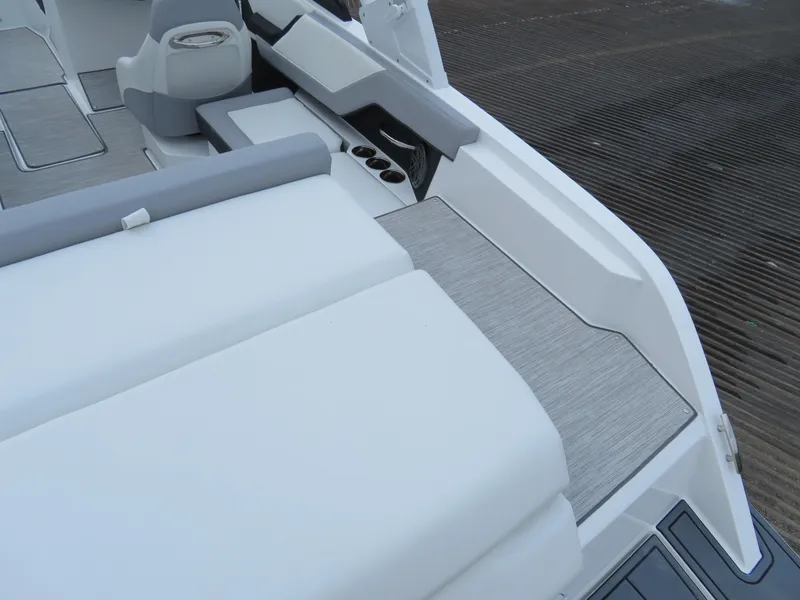 Slide: The Image of 2025 Cobalt CS22 boat interior with sleek seating and modern design. - 7