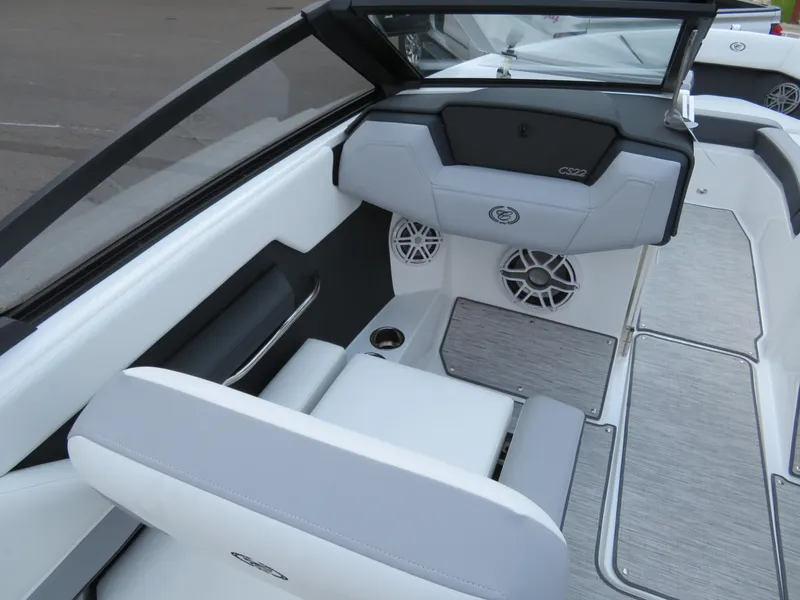 Slide: The Image of 2025 Cobalt CS22 boat interior with gray seating and modern design. - 9