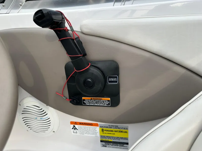Slide: The Image of 2003 Four Winns Freedom 180F/S boat throttle control and warning labels. - 15