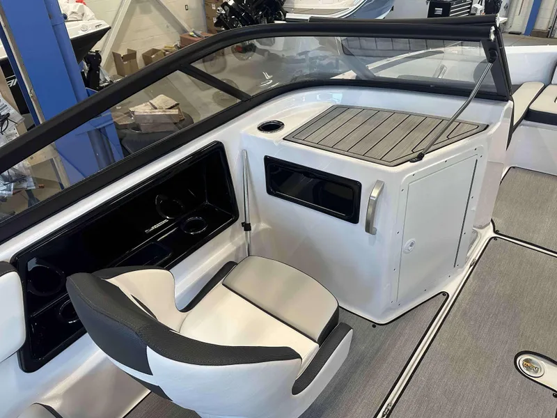 Slide: The Image of 2025 Yamaha Boats SX195 interior with seating and storage compartments. - 6