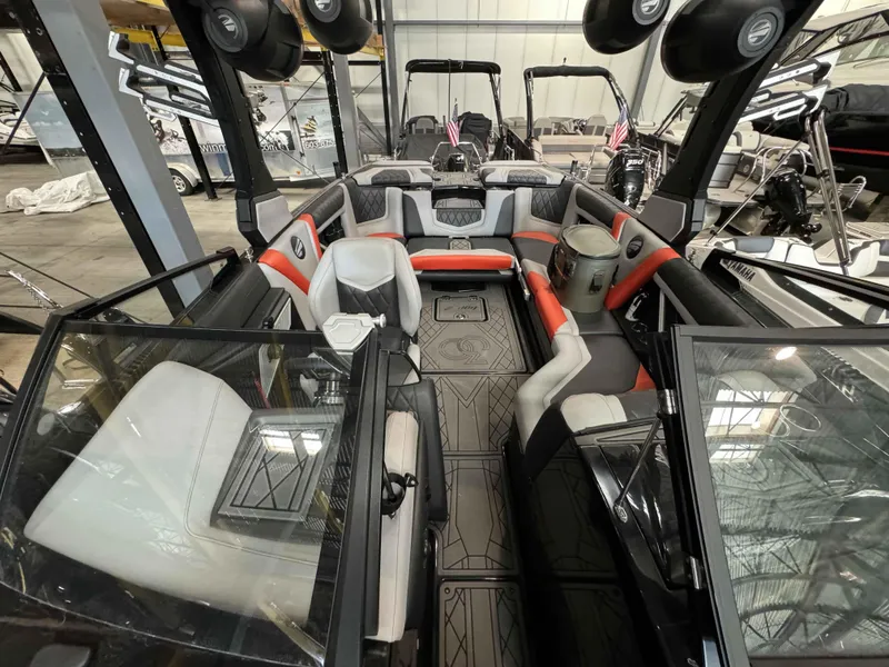 Slide: The Image of Interior of 2022 Tigé 23ZE boat with modern seating and sound system. - 12