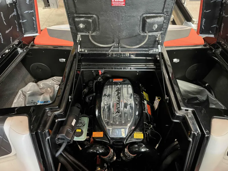 Slide: The Image of 2022 Tigé 23ZE boat engine compartment with Raptor motor. - 14