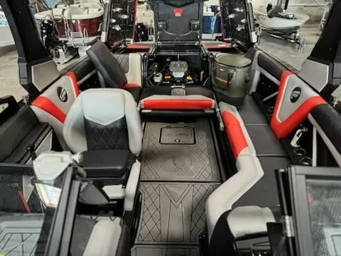 Slide: The Image of 2022 Tigé 23ZE boat interior with modern seating and sleek design. - 20