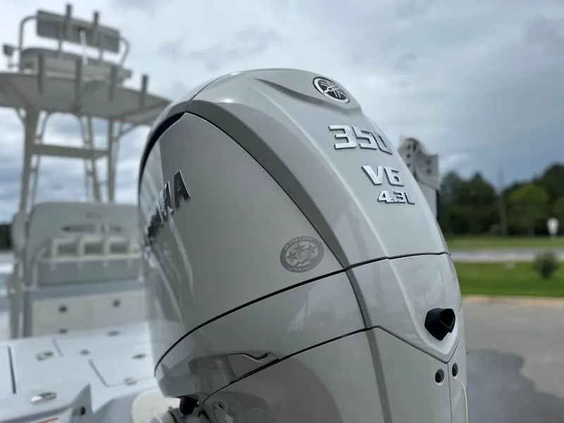 Slide: The Image of 2025 Pathfinder 2600 HPS boat with Yamaha 350 V8 engine, outdoor setting. - 10