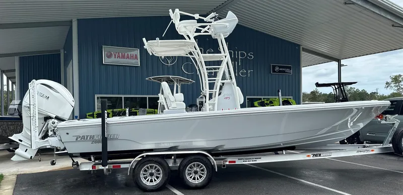 Slide: The Image of 2025 Pathfinder 2600 HPS boat on trailer, parked at dealership. - 12