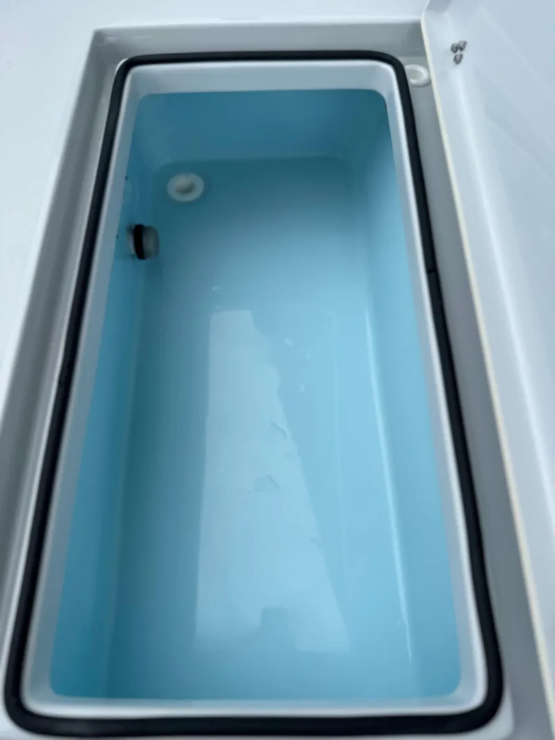 Slide: The Image of 2025 Pathfinder 2600 HPS boat livewell, open and empty. - 20