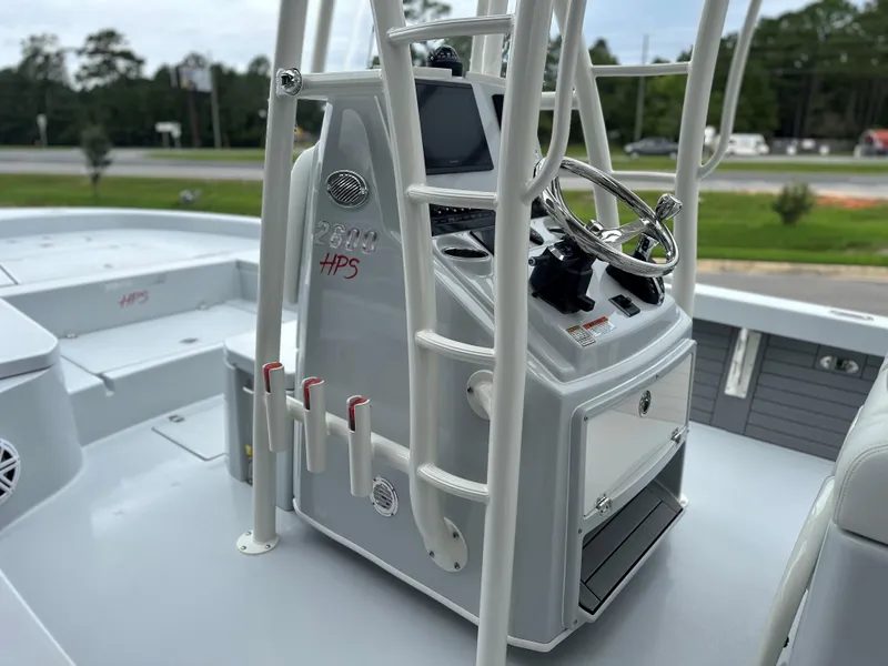 Slide: The Image of 2025 Pathfinder 2600 HPS boat console with steering wheel and controls. - 6