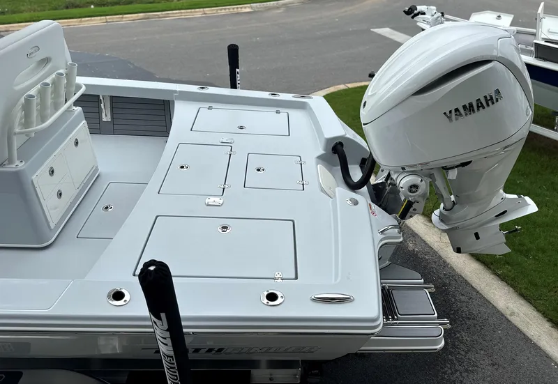 Slide: The Image of 2025 Pathfinder 2600 HPS boat with Yamaha outboard motor, rear deck view. - 7