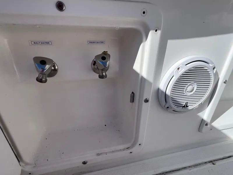 Slide: The Image of Boat water connections and speaker on Dakota 32 cc 2023 SUZUKI MOTORS, 1997 model. - 19