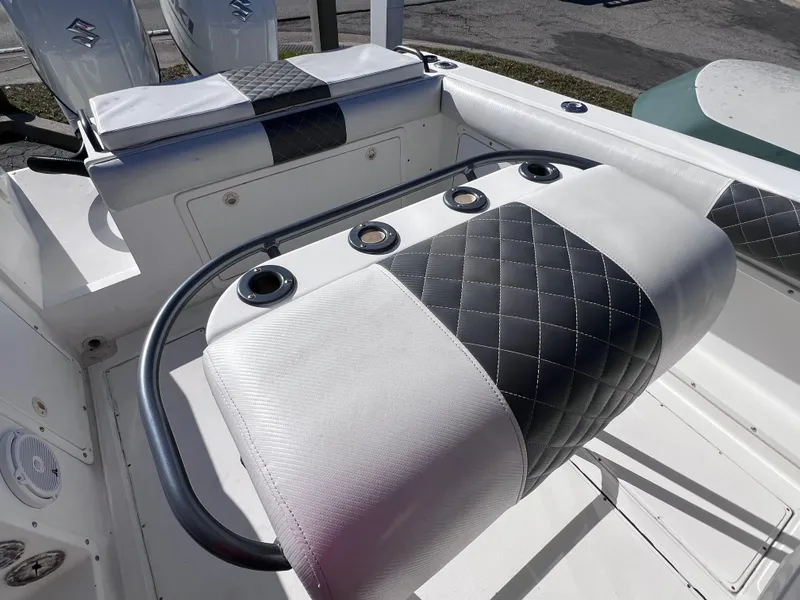 Slide: The Image of Dakota 32 cc 2023 Suzuki Motors boat interior with quilted seating, 1997 model. - 20