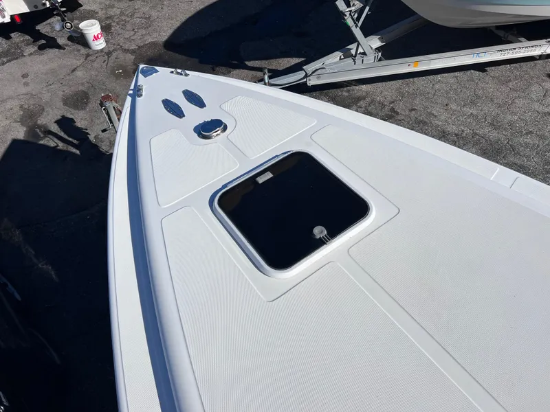 Slide: The Image of Bow of Dakota 32 cc 2023 SUZUKI MOTORS boat, 1997 model, with open hatch. - 5