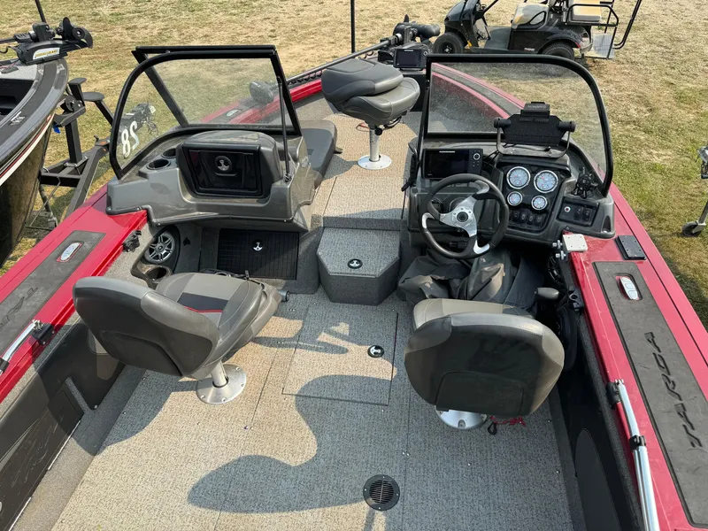 Slide: The Image of 2021 Tracker Targa V-19 Combo Tournament Edition boat interior with seating and dashboard. - 17