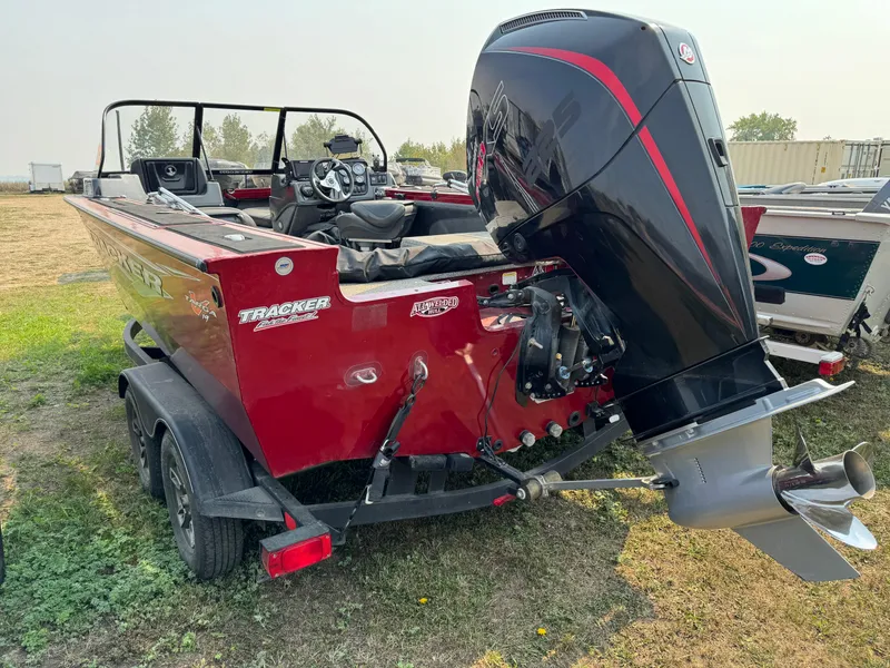 Slide: The Image of 2021 Tracker Targa V-19 Combo Tournament Edition boat with powerful outboard motor. - 4