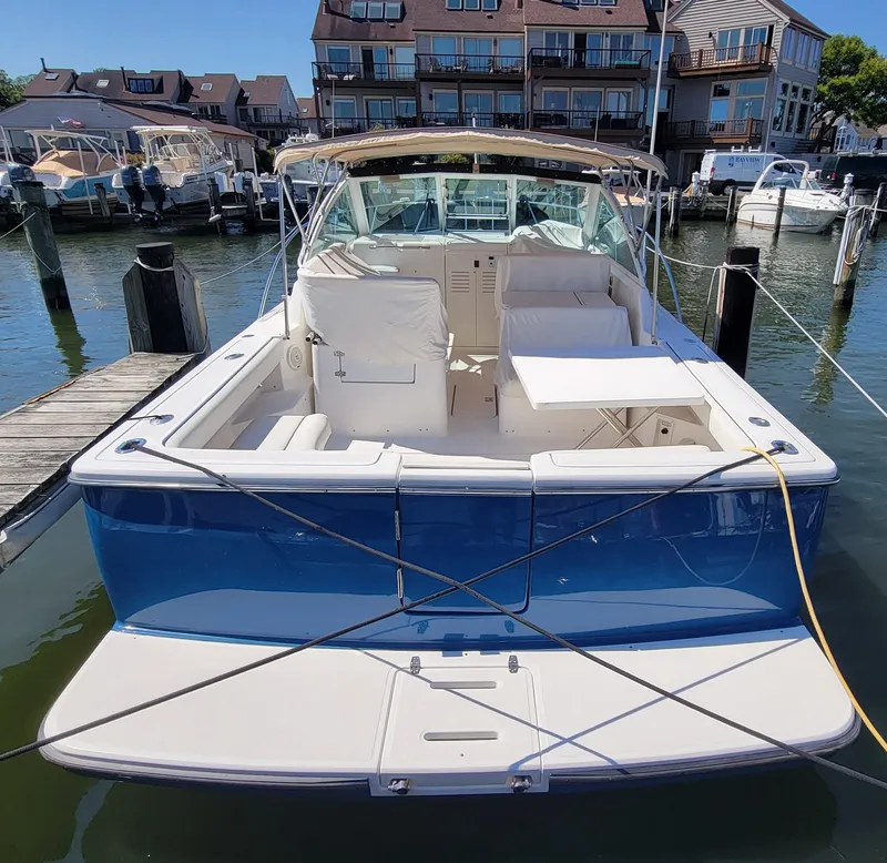 Slide: The Image of 2006 Tiara Yachts 2900 Coronet docked at marina, rear view. - 4