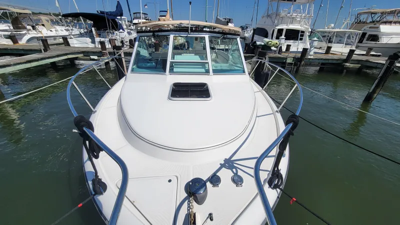 Slide: The Image of 2006 Tiara Yachts 2900 Coronet docked at marina, front view. - 9