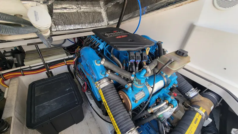 Slide: The Image of 2006 Tiara Yachts 2900 Coronet engine compartment with blue marine engine. - 31