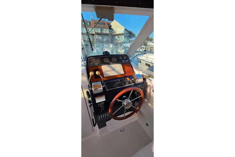 Slide: The Image of Helm of 2006 Tiara Yachts 2900 Coronet with Garmin navigation system. - 15