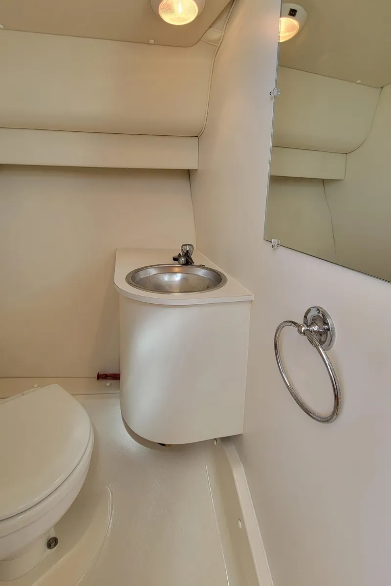 Slide: The Image of 2006 Tiara Yachts 2900 Coronet bathroom with sink and toilet. - 26