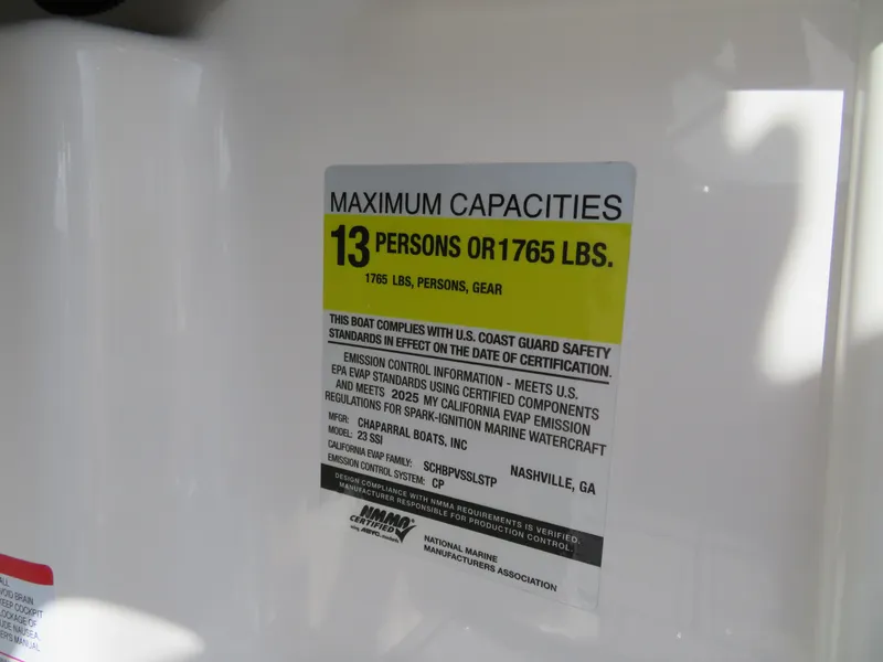 Slide: The Image of Capacity label on 2025 Chaparral 23 SSi boat: 13 persons or 1765 lbs. - 10