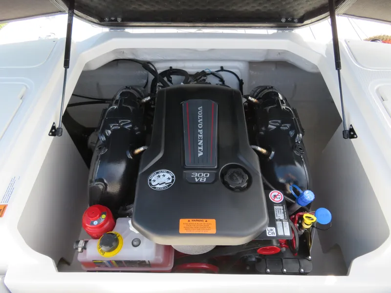 Slide: The Image of 2025 Chaparral 23 SSi boat engine compartment with Volvo Penta 300 V8 engine. - 14