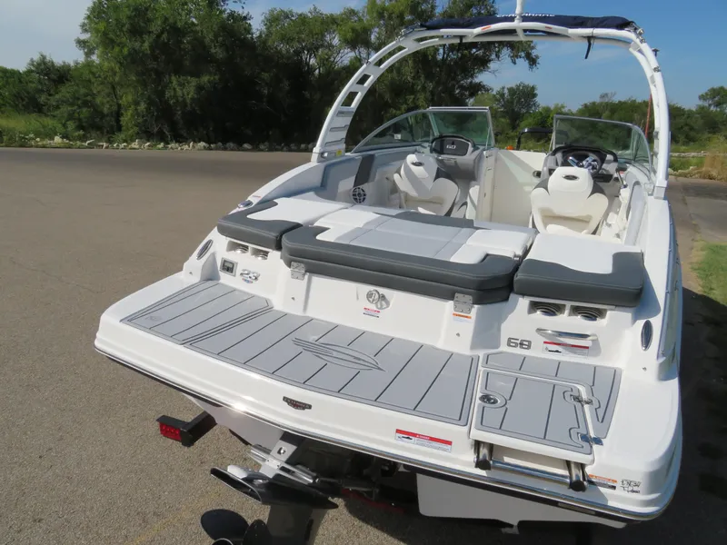 Slide: The Image of 2025 Chaparral 23 SSi boat with sleek design and spacious seating. - 3