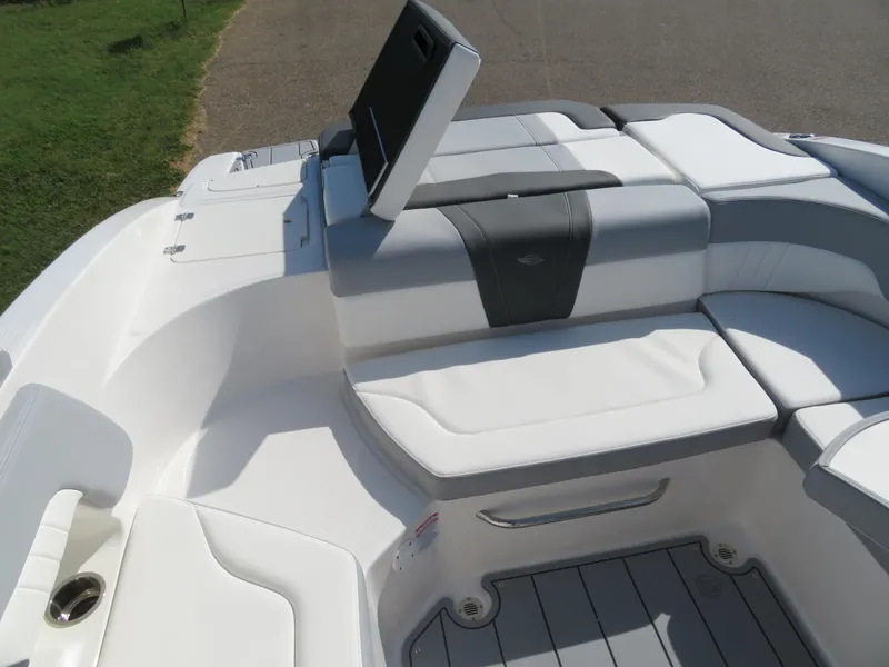 Slide: The Image of 2025 Chaparral 23 SSi boat interior with white and gray seating. - 4