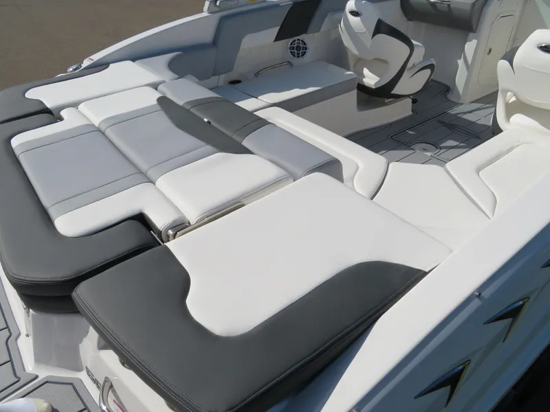 Slide: The Image of 2025 Chaparral 23 SSi boat interior with luxurious seating and modern design. - 7