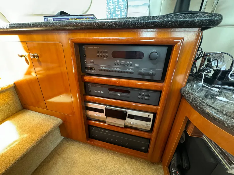 Slide: The Image of Entertainment system in 2000 Carver 530 Voyager Pilothouse, featuring audio and video equipment. - 14