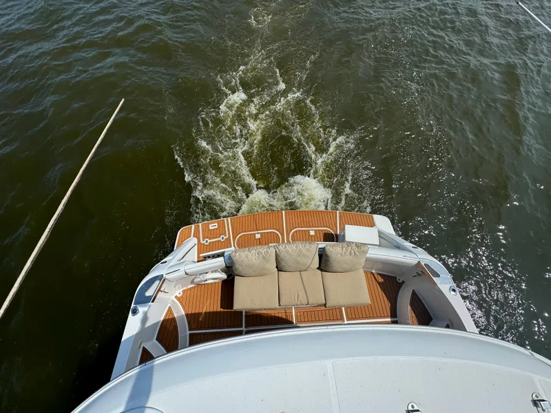 Slide: The Image of Carver 530 Voyager Pilothouse 2000 cruising on water, view from above. - 17