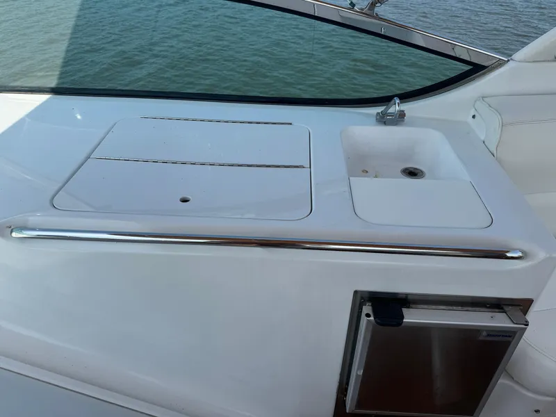 Slide: The Image of 2000 Carver 530 Voyager Pilothouse yacht sink and countertop detail. - 21