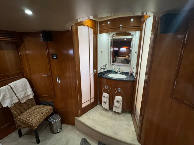 Slide: The Image of Luxurious bathroom interior of 2000 Carver 530 Voyager Pilothouse yacht with wood finish. - 29
