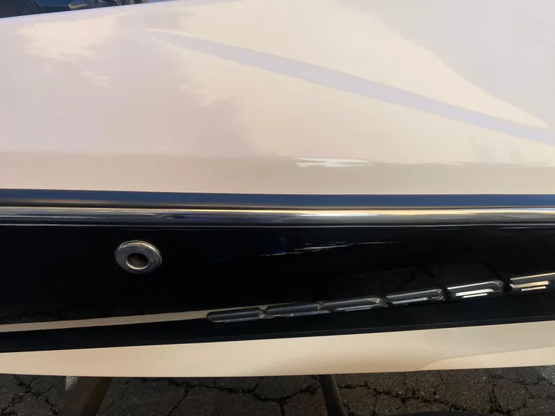 Slide: The Image of 2015 Scarab 165 Standard boat exterior detail with sleek design and chrome accents. - 2