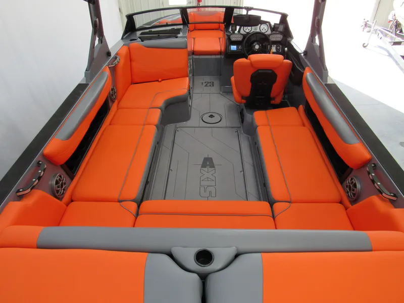 Slide: The Image of 2021 Axis T23 boat interior with orange and gray seating. - 4