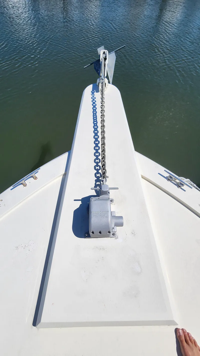 Slide: The Image of Bow of a 1969 Hatteras 36 Sport Fisherman with anchor chain. - 12