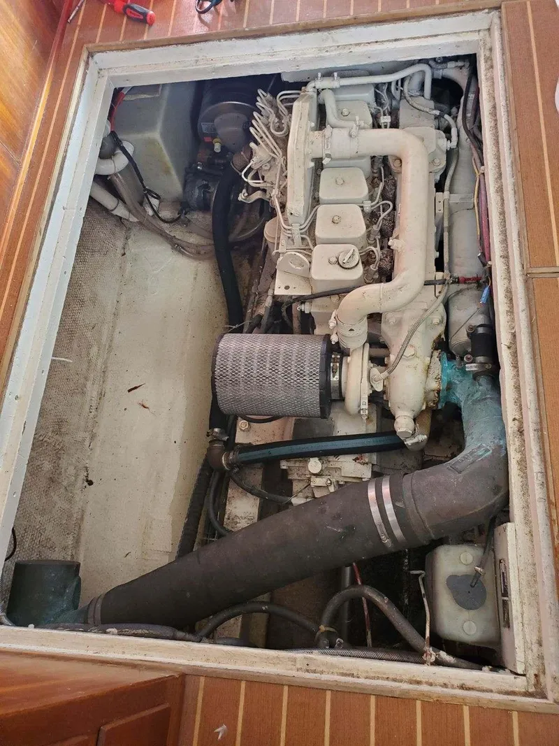 Slide: The Image of Engine compartment of a 1969 Hatteras 36 Sport Fisherman boat. - 38