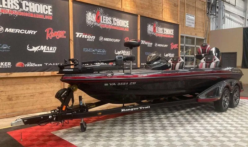 Slide: The Image of 2022 Ranger Z520R bass boat displayed indoors on a checkered floor. - 5